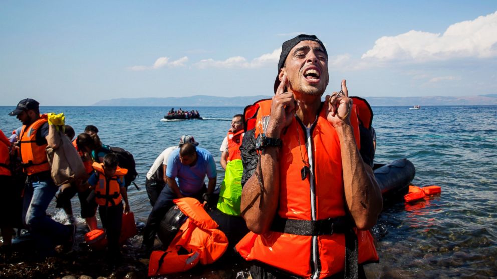 PHOTO: A refugee reacts after coming ashore near the village of Skala Sikamineas on Sept. 8, 2015 in Lesbos, Greece.