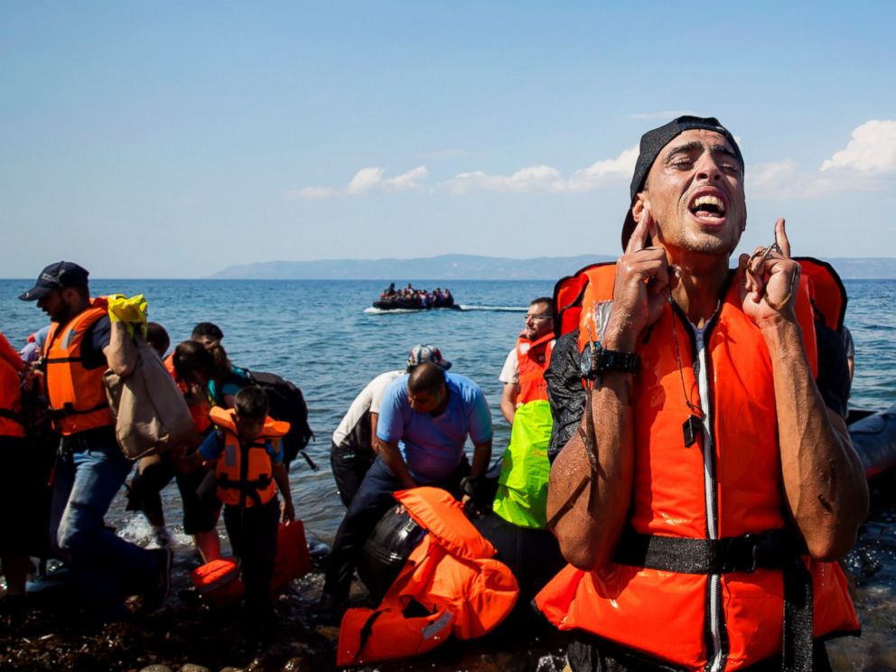 PHOTO: A refugee reacts after coming ashore near the village of Skala Sikamineas on Sept. 8, 2015 in Lesbos, Greece.