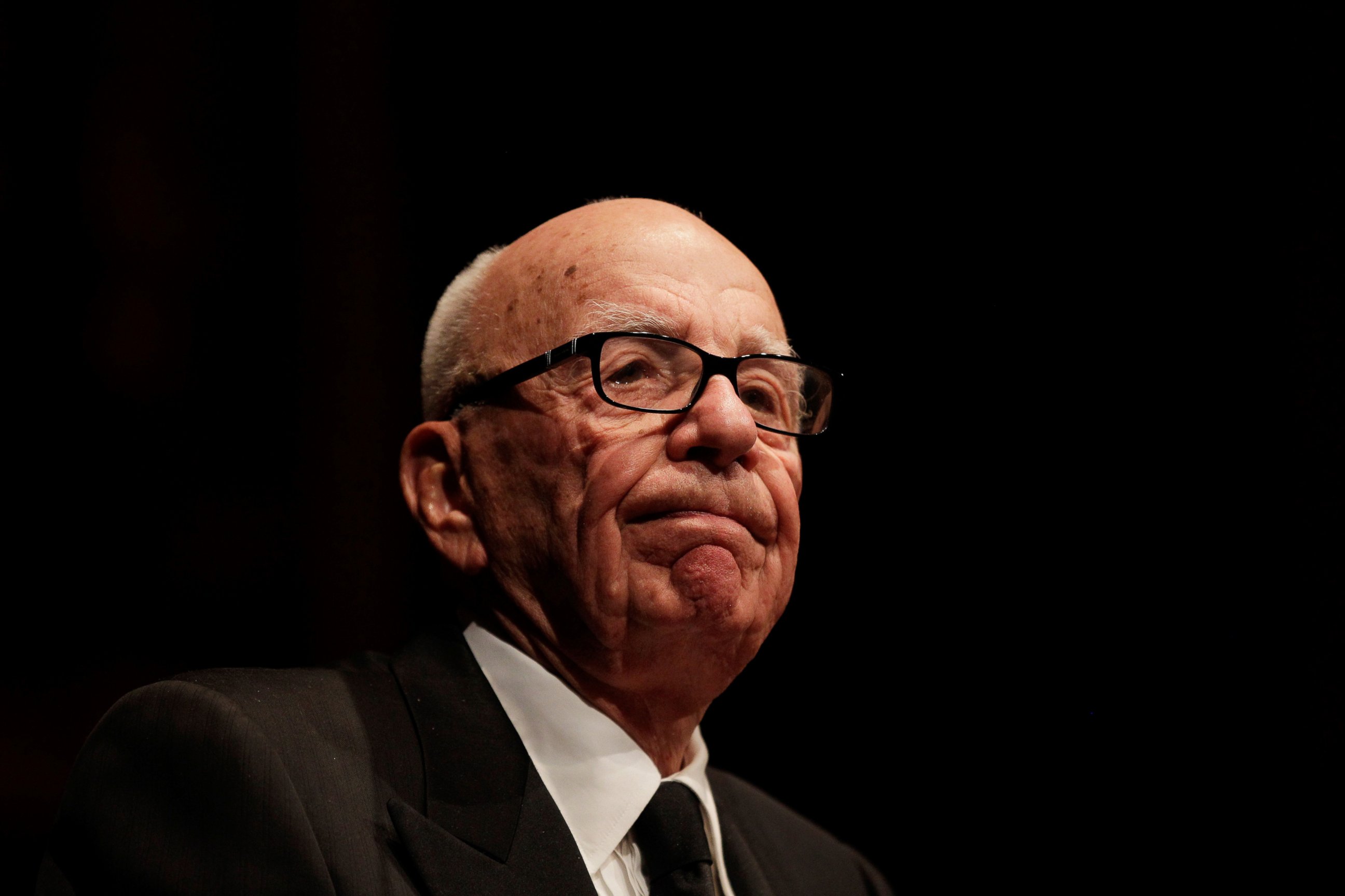 PHOTO: Rupert Murdoch, chairman and chief executive officer of News Corp., pauses during an event hosted by the Lowy Institute for International Policy in Sydney, Australia, on Oct. 31, 2013. 