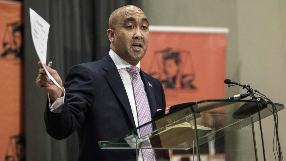 South African National Prosecuting Authority Shaun Abrahams holds the appeal papers during a press conference on May 23, 2016 at the NPA Head Office in Pretoria, South Africa.