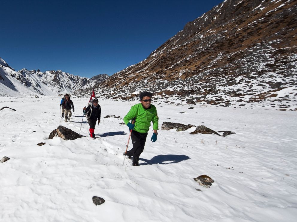 PHOTO: Nepalese mountaineer Apa Sherpa, who has scaled Mount Everest a record-breaking 21 times, is photographed while on the Great Himalaya Trail, one of the longest and highest trekking routes in the world, in the Nepalese Himalayas on January 22, 2012.