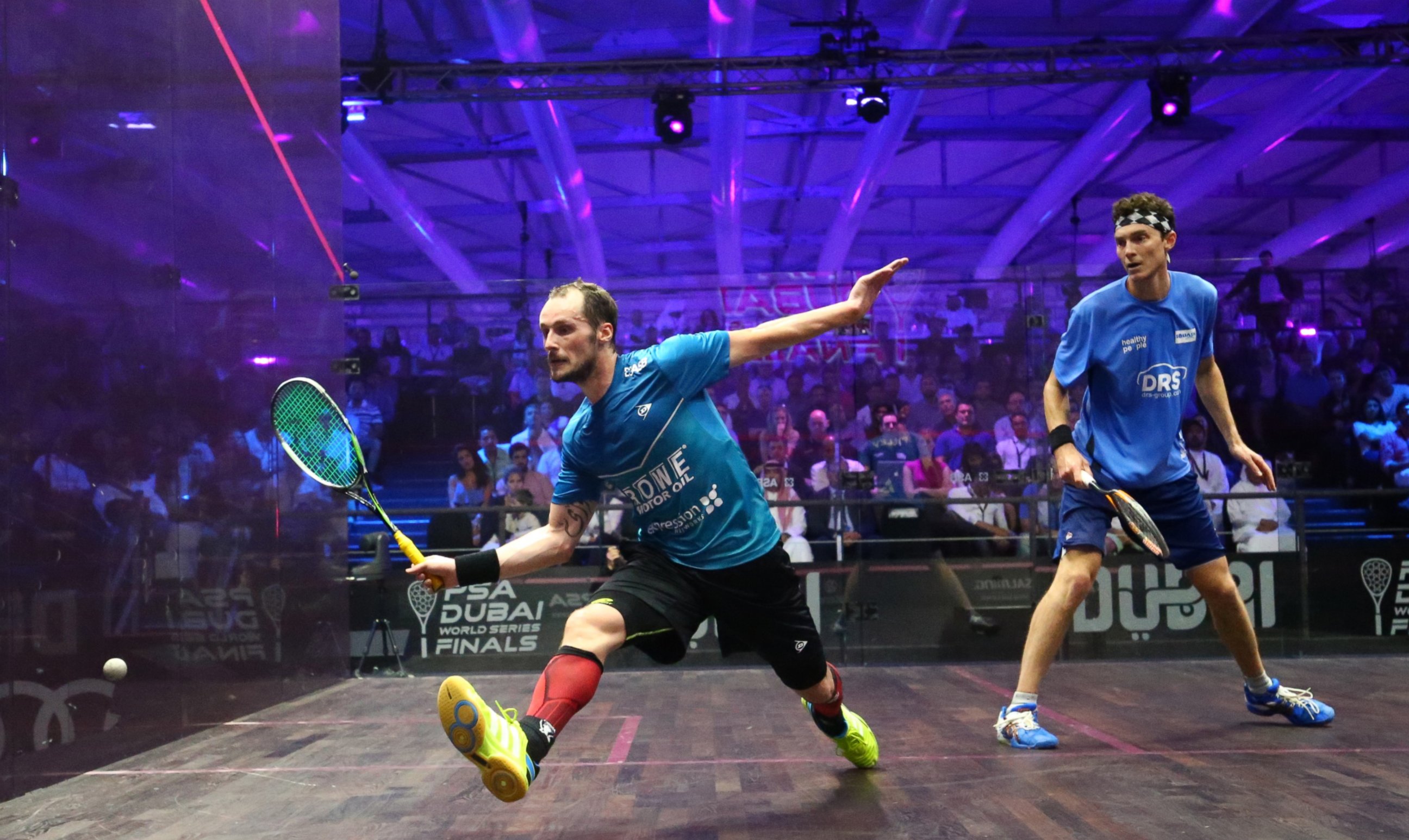 PHOTO: Gregory Gaultier of France plays a forehand to Cameron Pilley of Australia in the men's final match of the Dubai PSA World Series Finals squash tournament in Dubai on May 28, 2016.