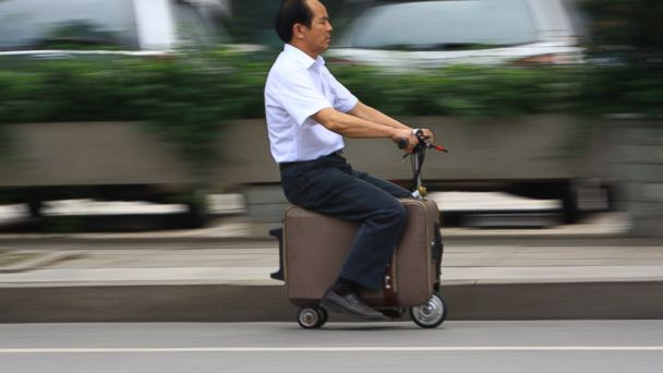 motorized suitcase ride on