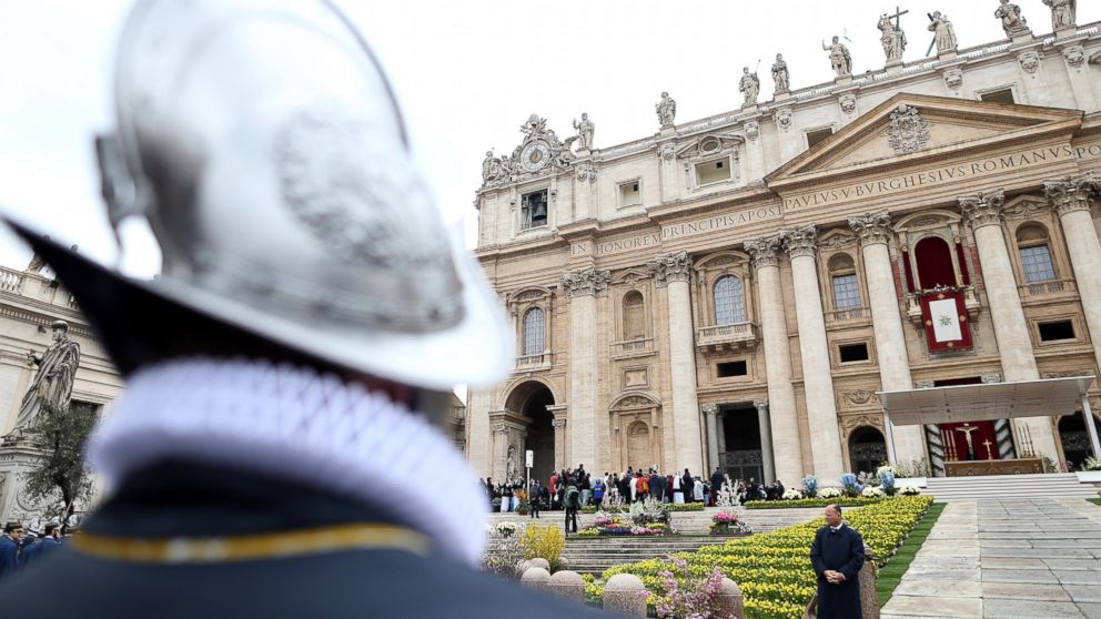 A Swiss Guard stands outside St. Peter's Basilica during Easter Mass on April 5, 2015 in Vatican City, Vatican.