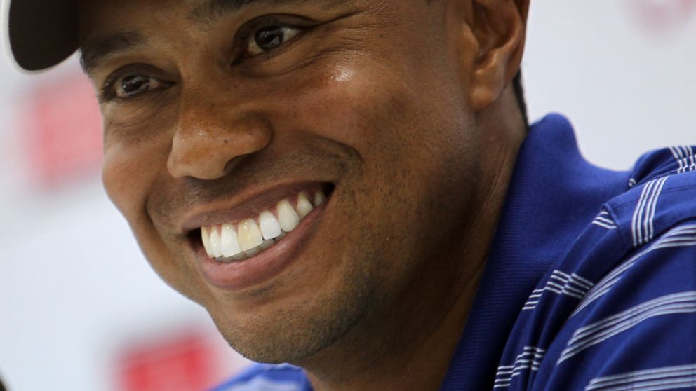 PHOTO: Tiger Woods smiles during a press conference prior to the start of the Dubai Desert Classic 2011 at the Emirates Golf Club on Feb. 9, 2011 in Dubai.