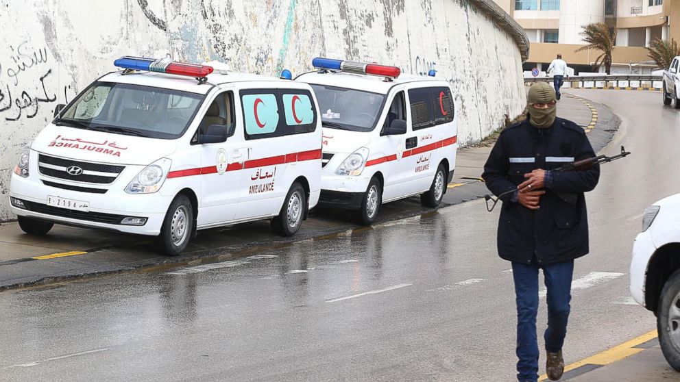 Libyan security forces and emergency services surround the Corinthia Hotel on Jan. 27, 2015, after a car bomb exploded outside the largest hotel in capital Tripoli on Tuesday.