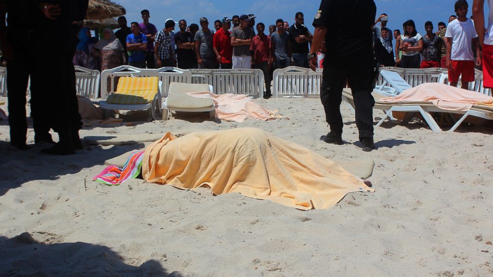PHOTO: The bodies of people are seen after an armed attack on a tourist hotel in Sousse, Tunisia, left at least 27 people dead, including foreigners, and injured six others , on June 26, 2015. 