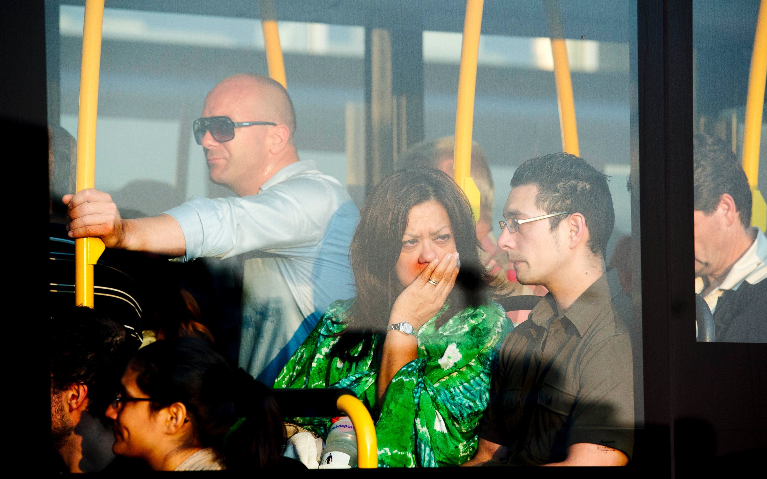 PHOTO: Family members of passengers killed in the crash of Air Malaysia flight MH17 leave Schiphol airport in a bus on July 17, 2014 in Amsterdam, Netherlands.