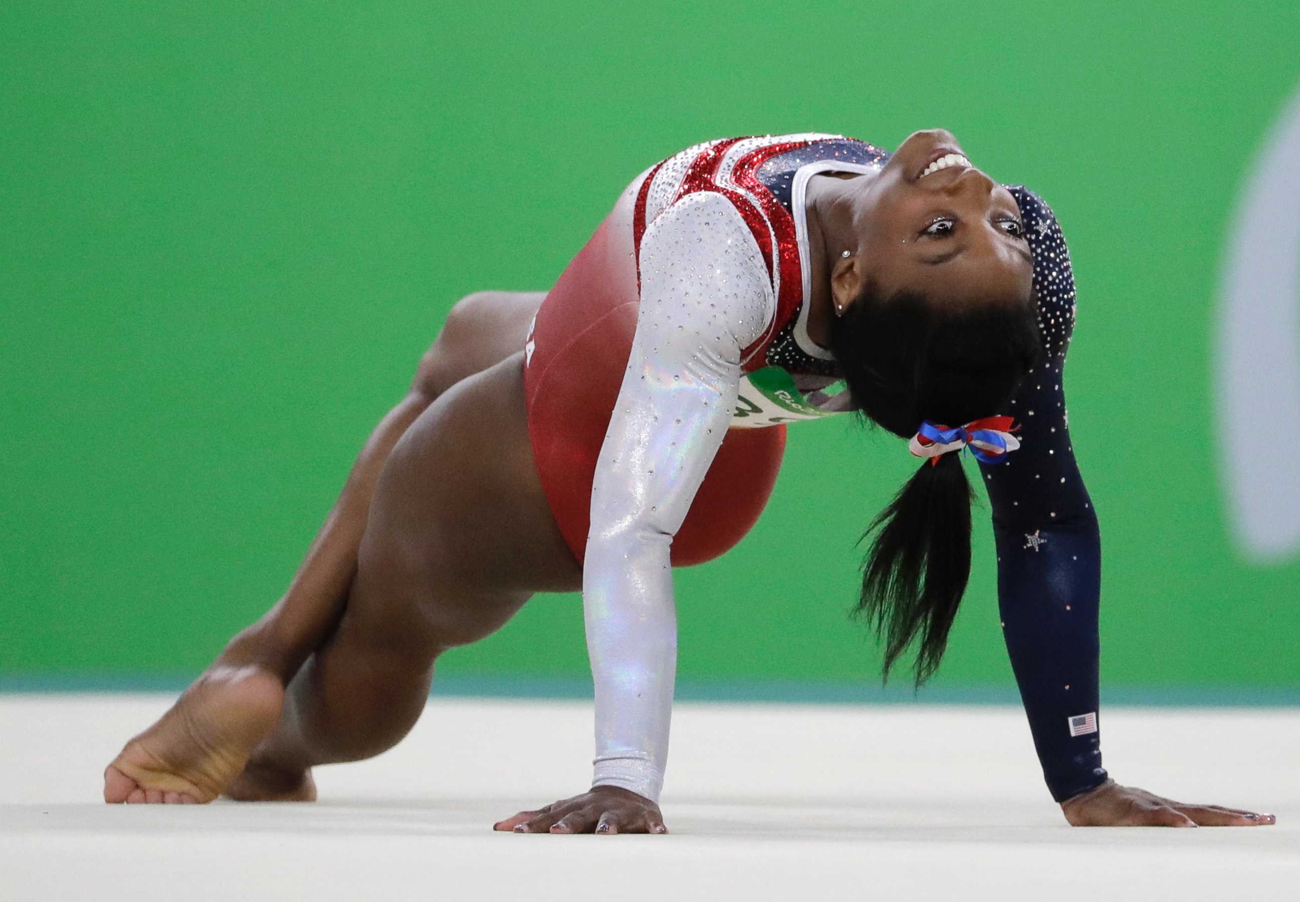 PHOTO: United States' Simone Biles performs on the floor during the artistic gymnastics women's team final at the 2016 Summer Olympics in Rio de Janeiro, Brazil, Aug. 9, 2016.