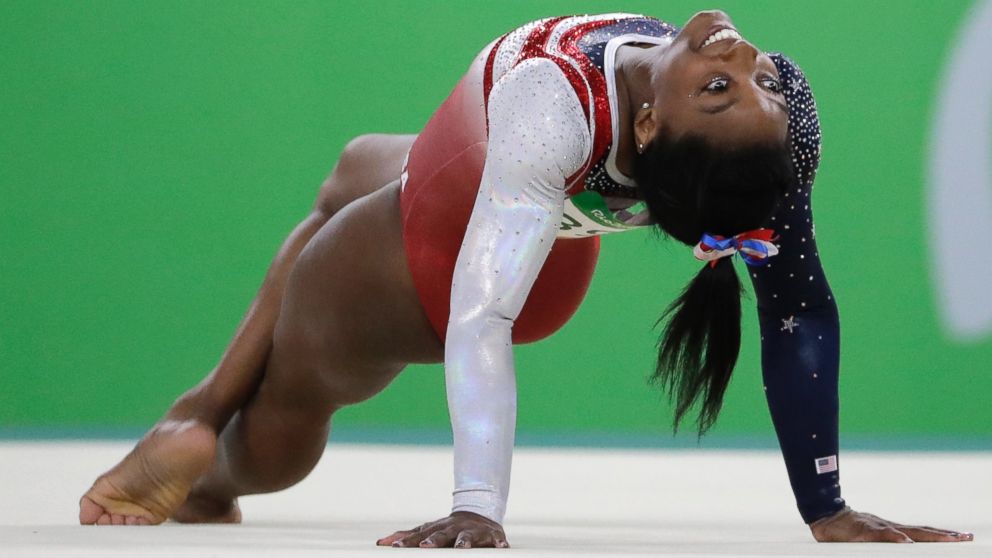 PHOTO: United States' Simone Biles performs on the floor during the artistic gymnastics women's team final at the 2016 Summer Olympics in Rio de Janeiro, Brazil, Aug. 9, 2016.
