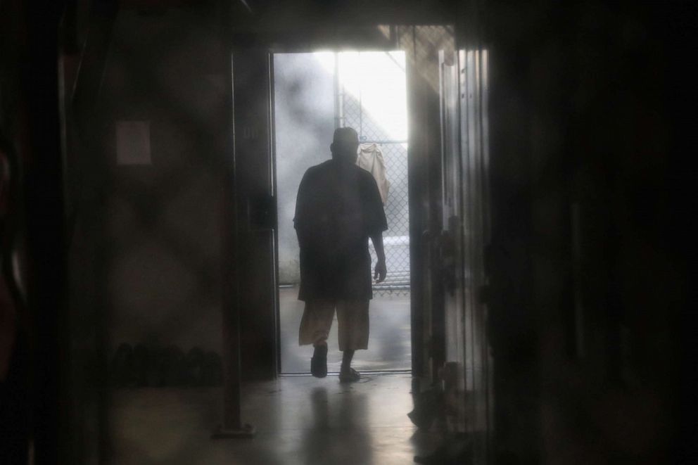 PHOTO: A prisoner walks to an outdoor area of the "Gitmo" maximum security detention center on Oct. 22, 2016 at the U.S. Naval Station in Guantanamo Bay, Cuba.