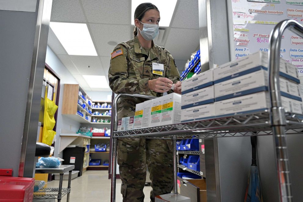 PHOTO: Sgt. Katrina Byrne of the Kentucky National Guard labels pharmaceuticals as a pharmacy technician at St. Claire Regional Medical Center on Sept. 16, 2021, in Morehead, Kentucky.