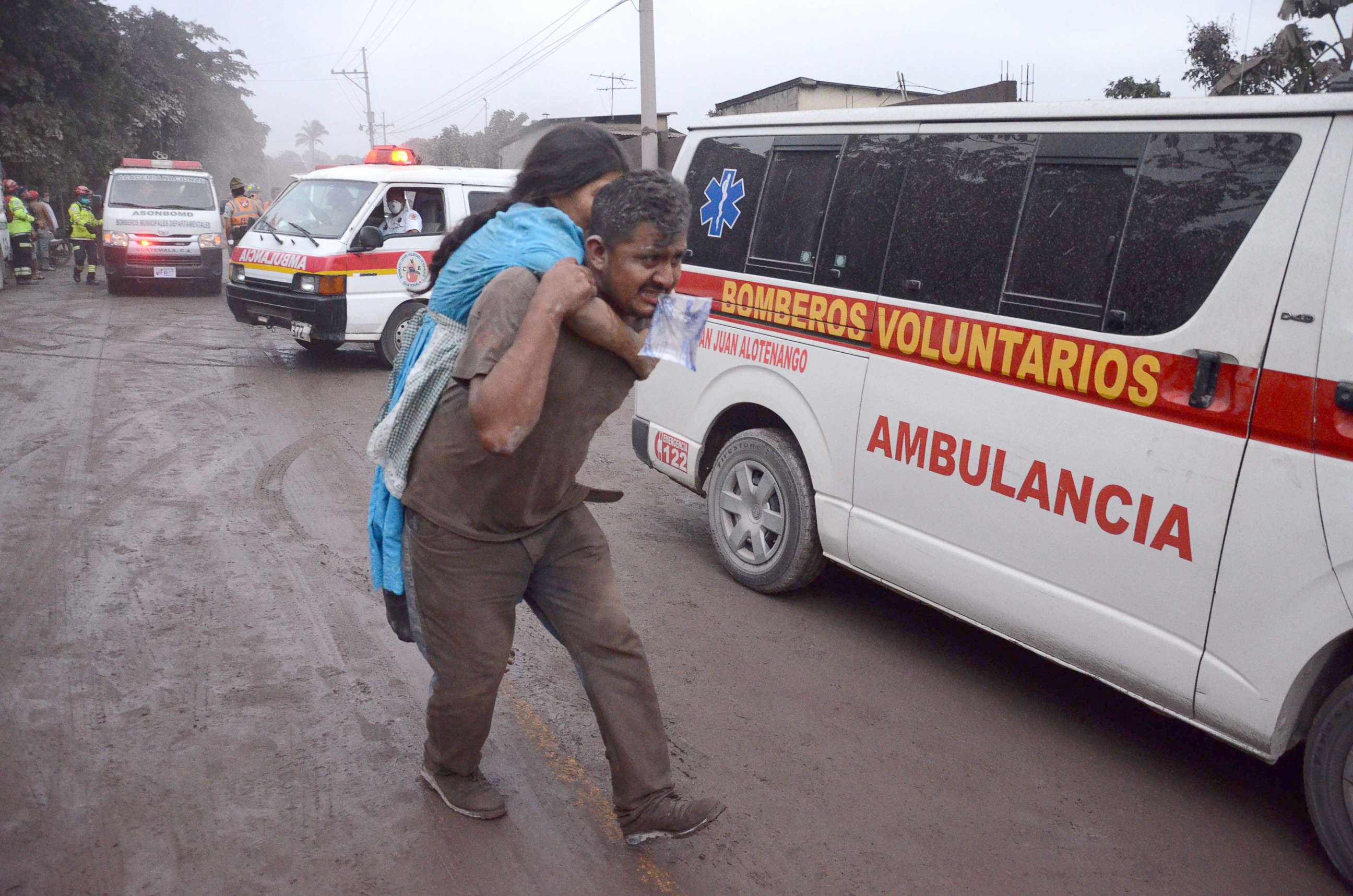 PHOTO: People flee El Rodeo village, Escuintla department, 22 miles south of Guatemala City, after the eruption of the Fuego Volcano, June 3, 2018.