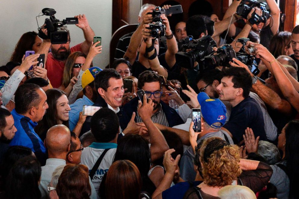 PHOTO:Venezuela's National Assembly head and self-proclaimed "acting president" Juan Guaido, leaves after attending mass at the San Jose church in Caracas, Jan. 27, 2019. 