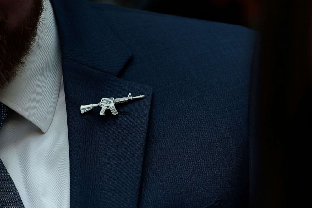 PHOTO: A congressional staffer wears a rifle-shaped pin at a House Judiciary Committee mark up hearing for the "Protecting Our Kids Act," a legislative package of gun violence prevention measures, on Capitol Hill, June 02, 2022, in Washington.