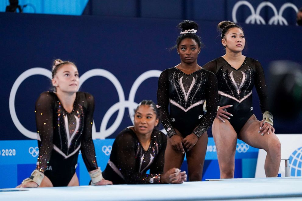 PHOTO: From left, Grace McCallum, Jordan Chiles, Simone Biles, and Sunisa Lee of the United States wait their turn to train on vault for artistic gymnastics at Ariake Gymnastics Centre venue ahead of the 2020 Summer Olympics.