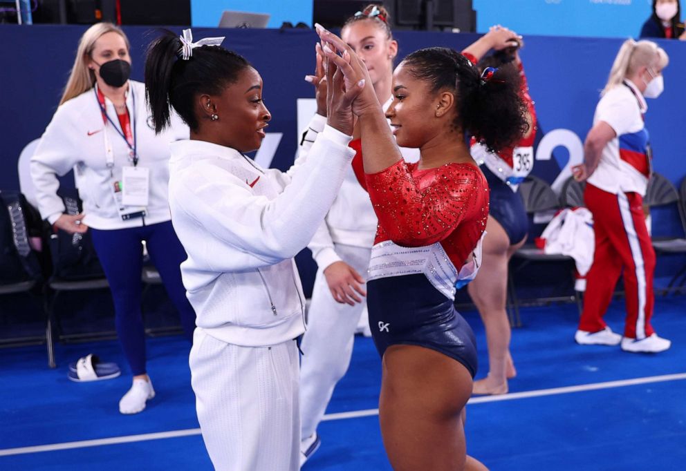 PHOTO: Simone Biles of the United States congratulates Jordan Chiles on July 27, 2021, in Tokyo.