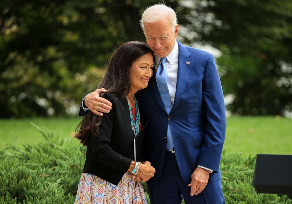 PHOTO: President Joe Biden embraces Secretary of the Interior Deb Haaland before announcing the expansion of areas of three national monuments at the White House on Oct. 08, 2021, in Washington.