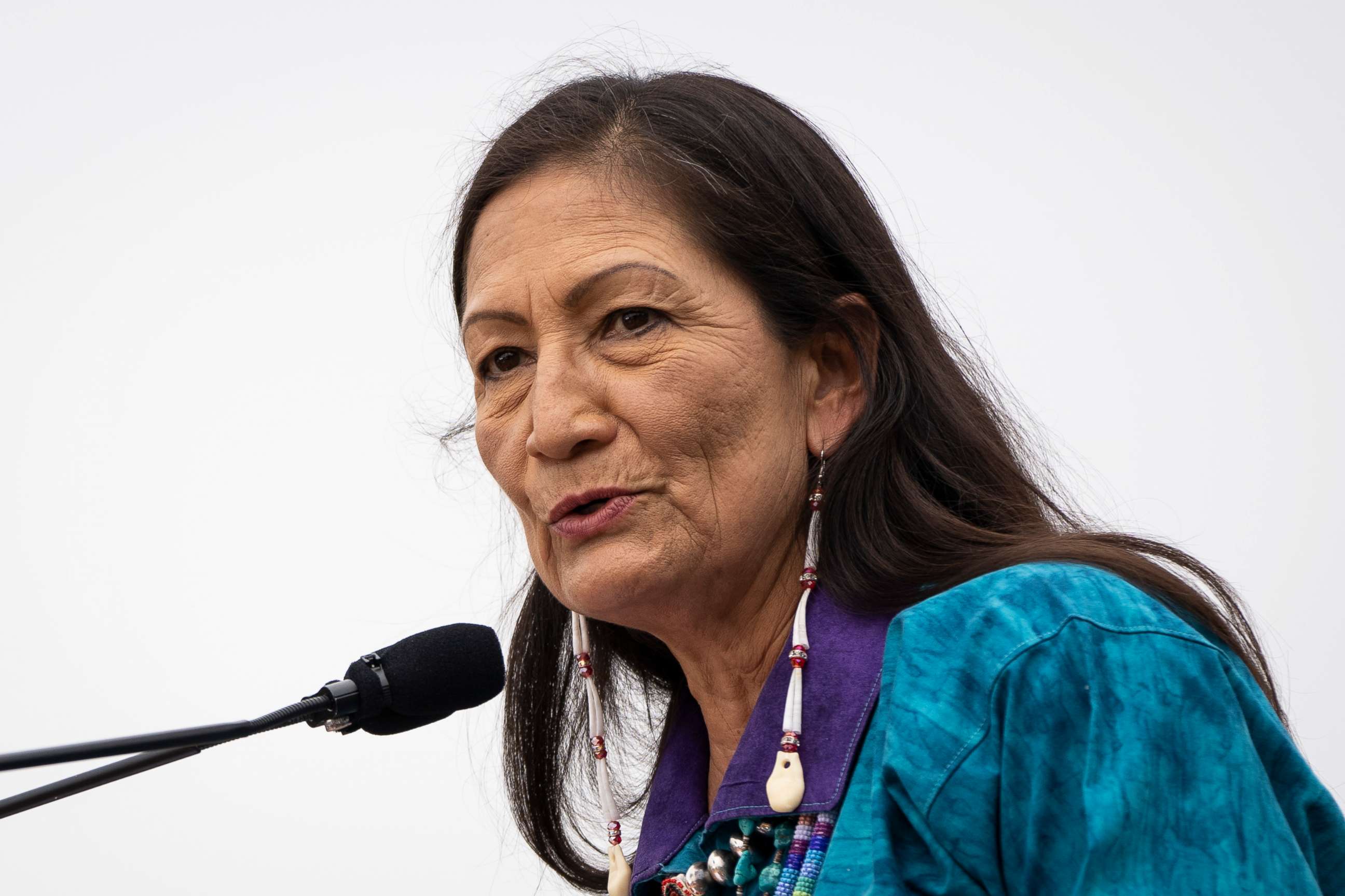 PHOTO: Secretary of the Interior Deb Haaland speaks during a welcome ceremony for a totem pole carved by the House of Tears Carvers of the Lummi Nation, on the National Mall, July 29, 2021, in Washington, D.C.