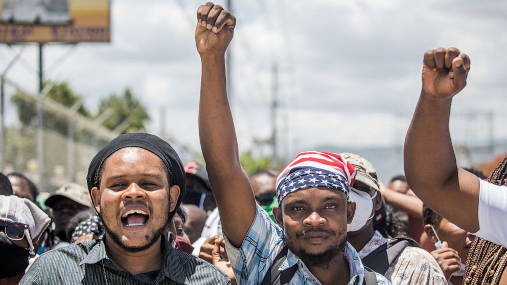 PHOTO: People gather in front of the US Embassy in Tabarre, Haiti on July 10, 2021, asking for asylum after the assassination of President Jovenel Moise amid fears of insecurity in the country.
