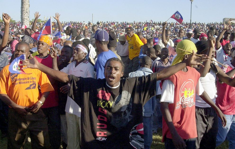 PHOTO: Supporters of Jean Bertrand Aristide celebrate the 200th anniversary of Haiti's independence from France, in Port-au-Prince, Haiti, Jan. 1, 2004.