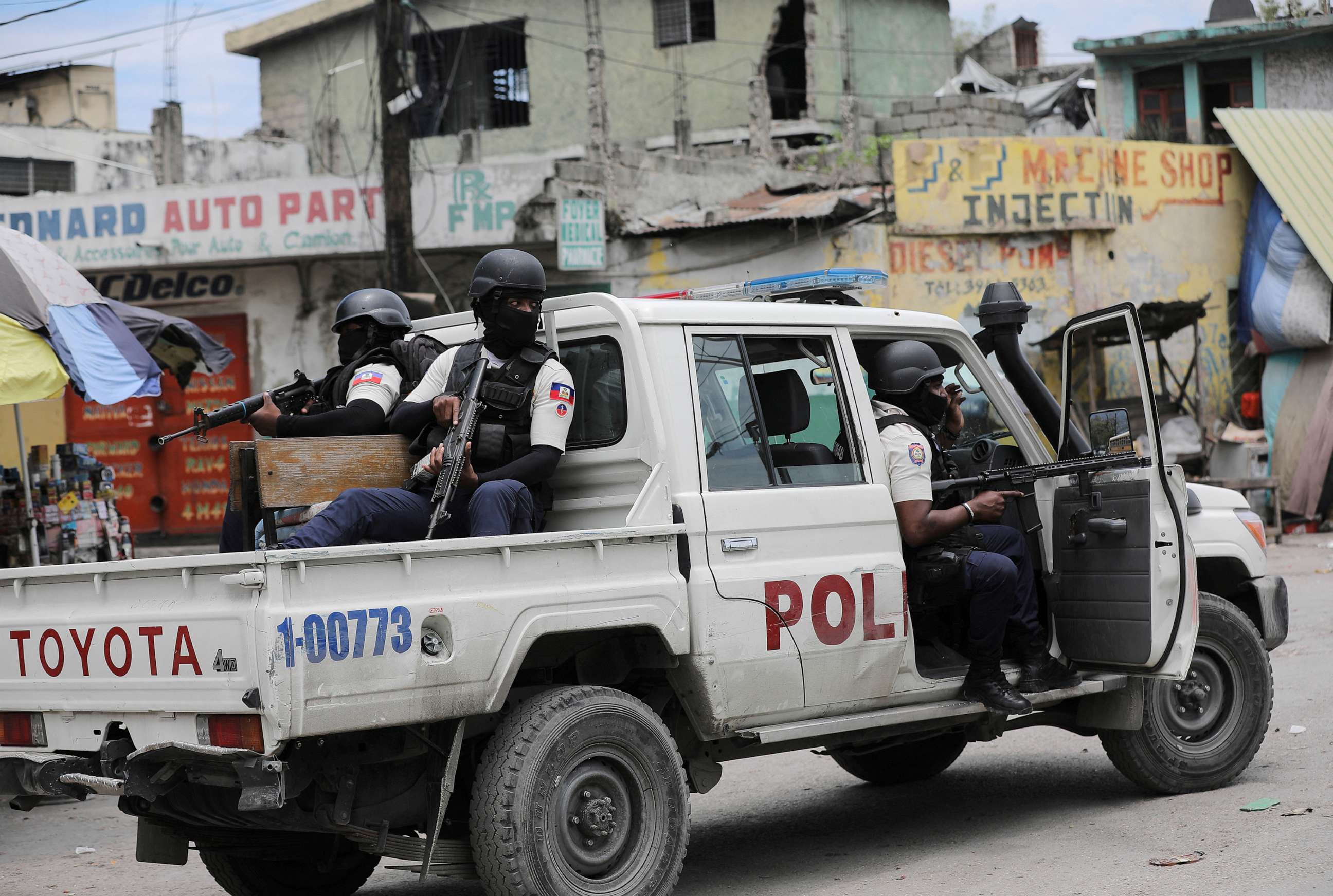 PHOTO: In this April 25, 2023, file photo. police patrol the streets after gang members tried to attack a police station, in Port-au-Prince, Haiti.