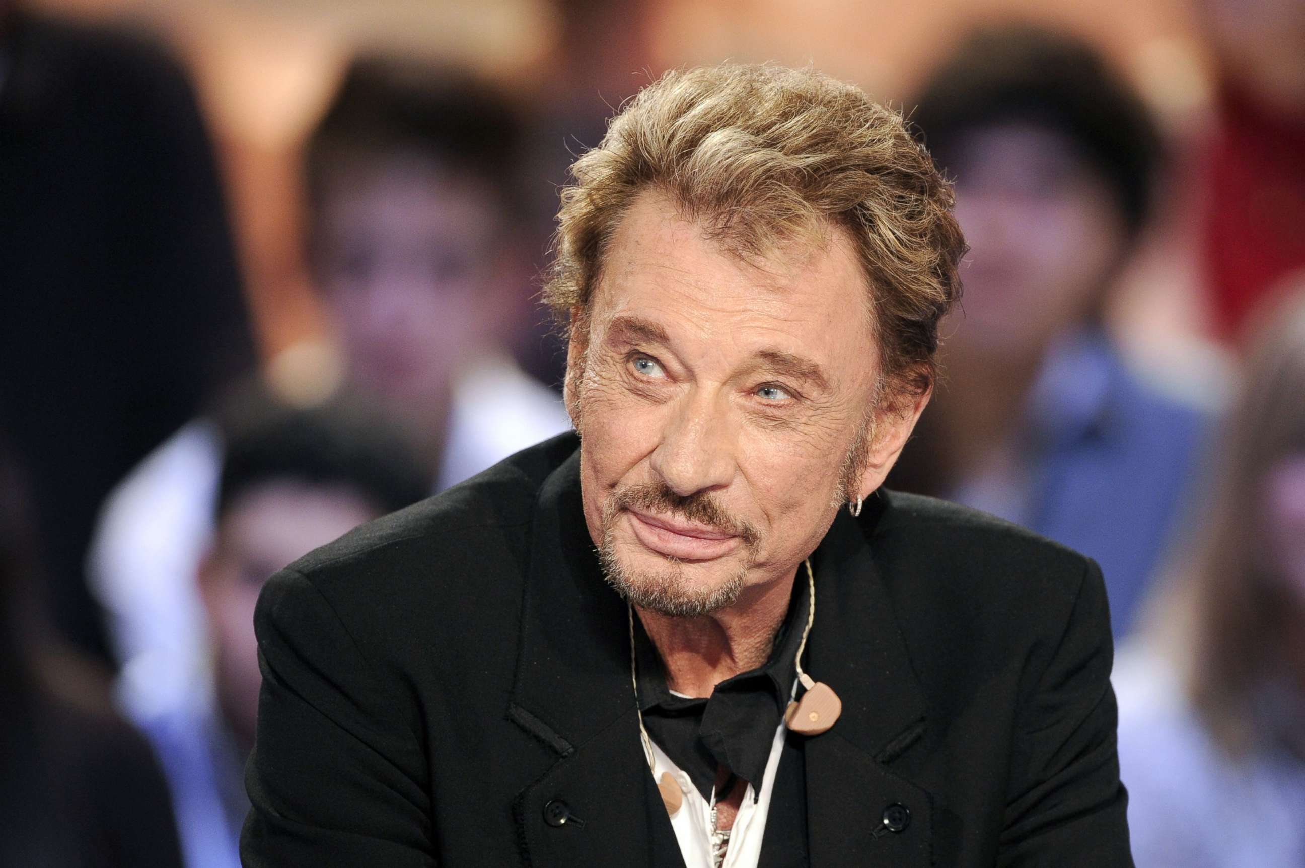 PHOTO: Johnny Hallyday attends the TV broadcast show "Le Grand Journal" on Canal + TV channel in Paris, March 28, 2011.
