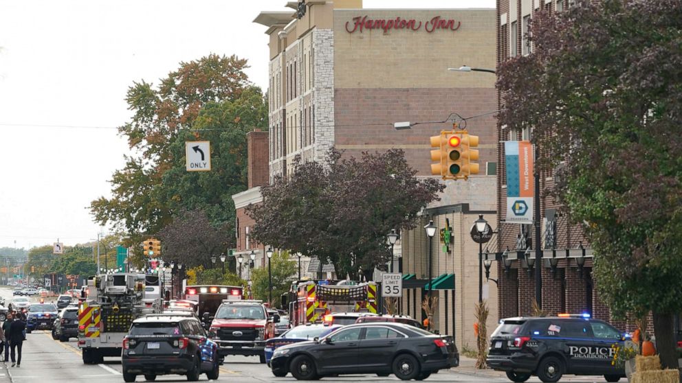 PHOTO: Police vehicles are parked outside the Hampton Inn in Dearborn, Mich., Oct. 6, 2022.
