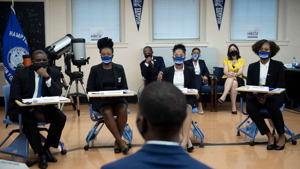 PHOTO: FILE - Students and others listen during a discussion with US Vice President Kamala Harris as she tours Hampton University, Sept. 10, 2021, in Hampton, Virginia.
