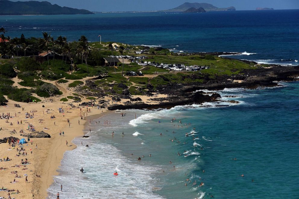 PHOTO: People swim along the southeast coast of Oahu near Hanauma Bay, Hawaii, Dec. 31, 2013.