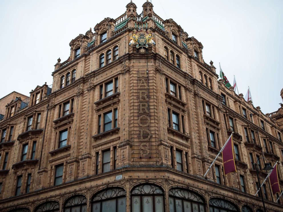 PHOTO: The Harrods name is illuminated in lights on the front of the department store in Knightsbridge on Nov. 29, 2017, in London.