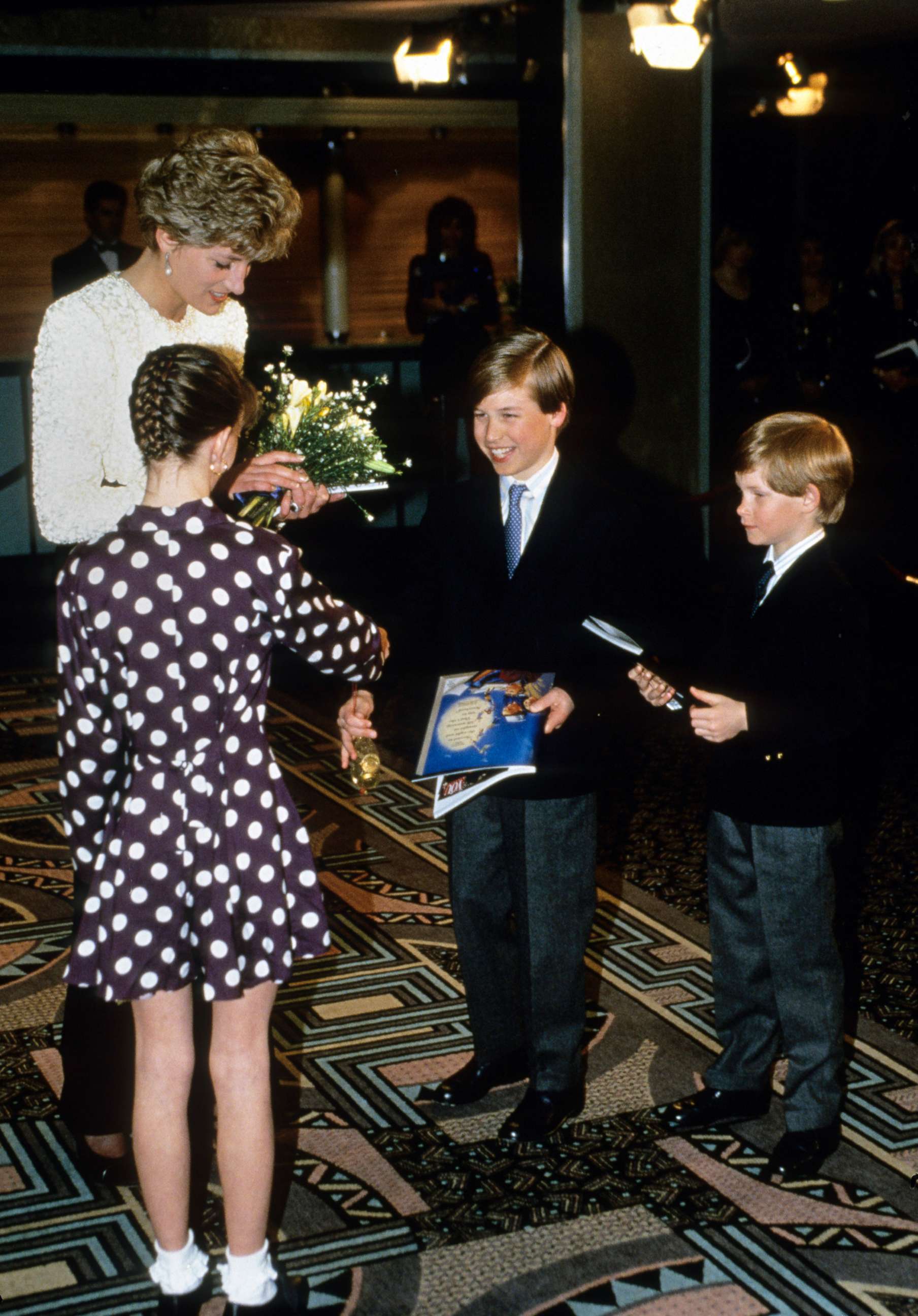 PHOTO: Diana, Princess of Wales, with her sons, Prince William and Prince Harry, visit Great Ormand Street Hospital for Children, April 5, 1992 in London.