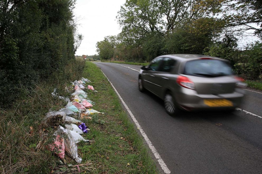 PHOTO: Floral tributes lay on the roadside near RAF Croughton in Northamptonshire, England, Oct. 10, 2019, at the spot where 19-year-old Harry Dunn was killed in a traffic collision on Aug. 27, 2019.