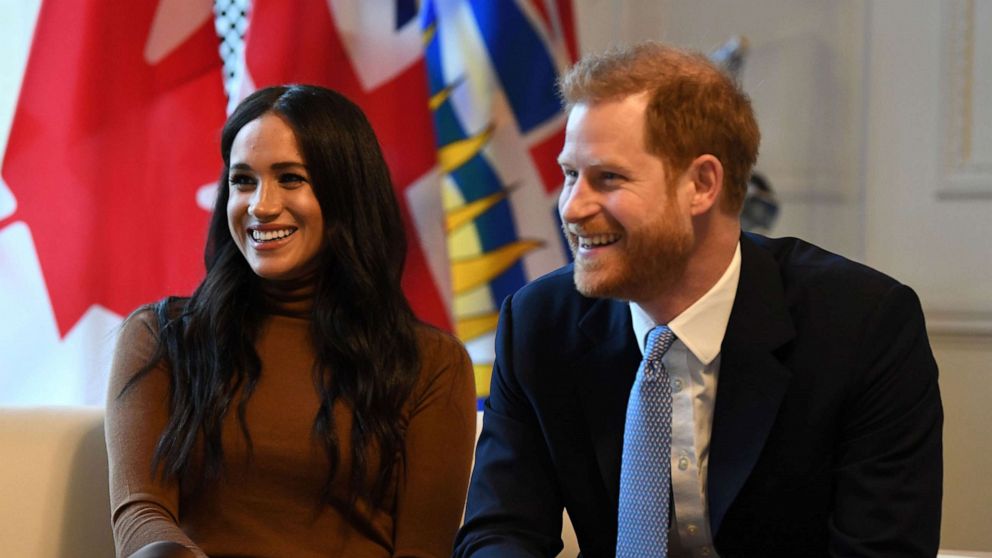 PHOTO: Britain's Prince Harry, Duke of Sussex and Meghan, Duchess of Sussex react during their visit to Canada House in thanks for the warm Canadian hospitality and support they received during their recent stay in Canada, in London on Jan. 7, 2020.