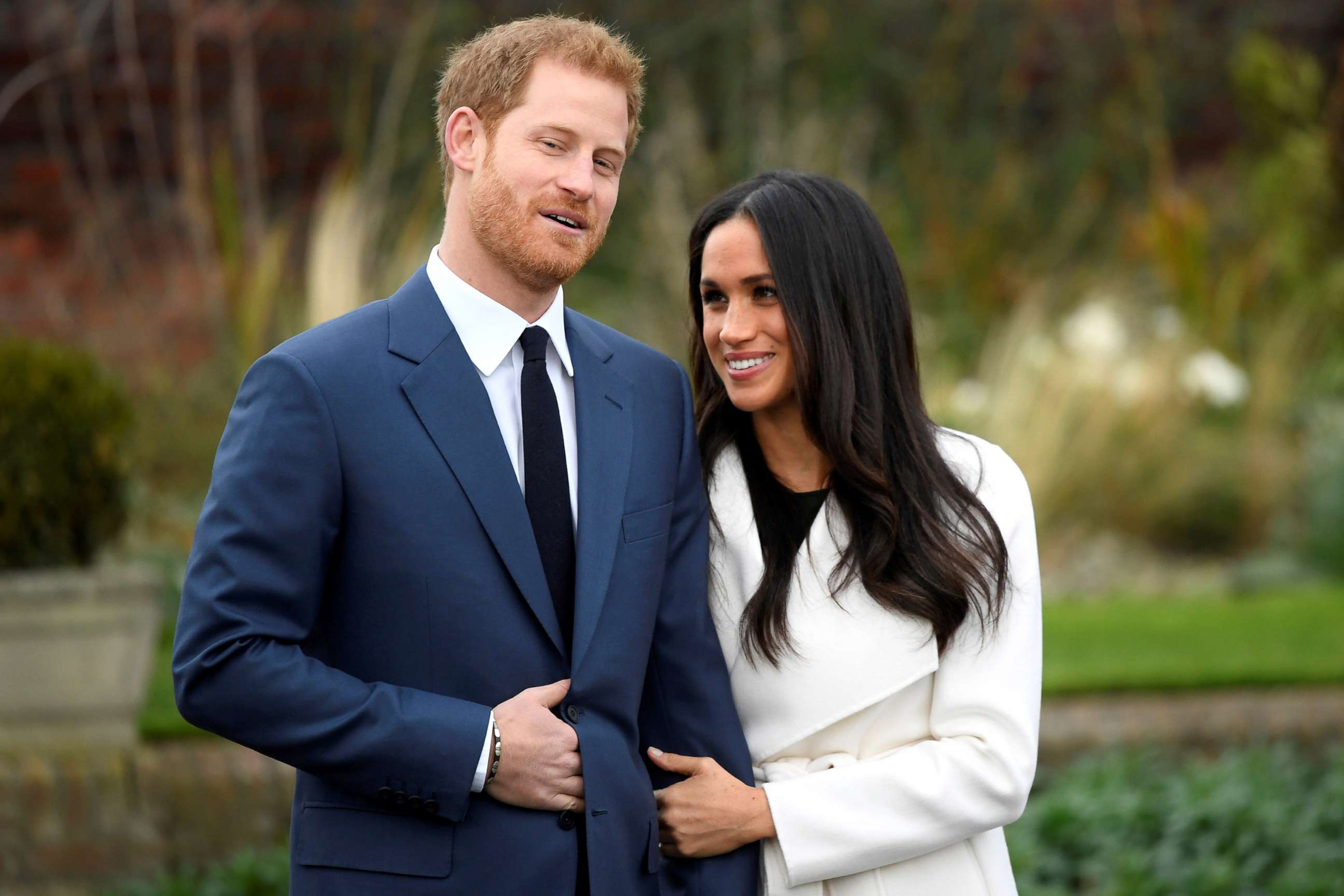 PHOTO: Britain's Prince Harry poses with Meghan Markle in the Sunken Garden of Kensington Palace, London, Nov. 27, 2017.