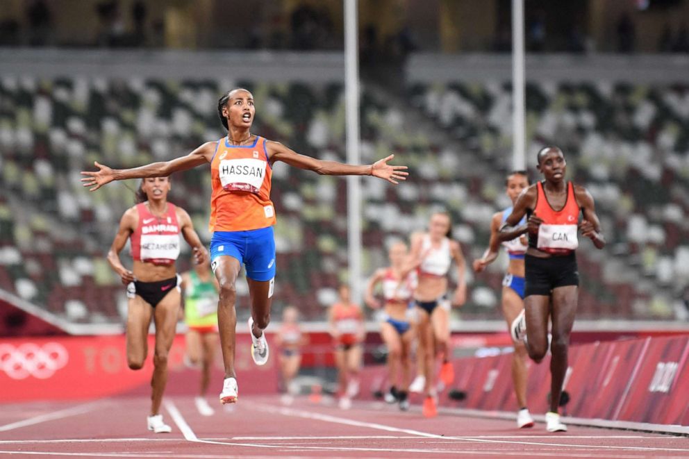 PHOTO: Netherlands' Sifan Hassan reacts as she crosses the finish line to win the women's 10,000m final during the Tokyo 2020 Olympic Games at the Olympic Stadium in Tokyo on Aug. 7, 2021.