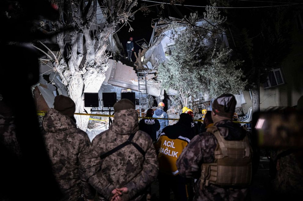 PHOTO: Rescue team members search for people in a destroyed building during the aftermath of an earthquake in Hatay, Turkey, Monday, Feb. 20, 2023.