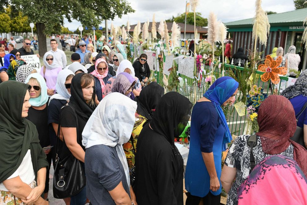 PHOTO: Women wearing headscarves are invited into the grounds of the Hastings Mosque before prayers on March 22, 2019 in Hastings, New Zealand.