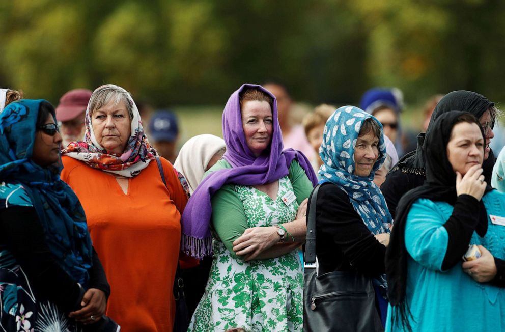 PHOTO: Women wearing headscarves as tribute to the victims of the mosque attacks are seen before  prayers at Hagley Park outside Al-Noor mosque in Christchurch, New Zealand, March 22, 2019.