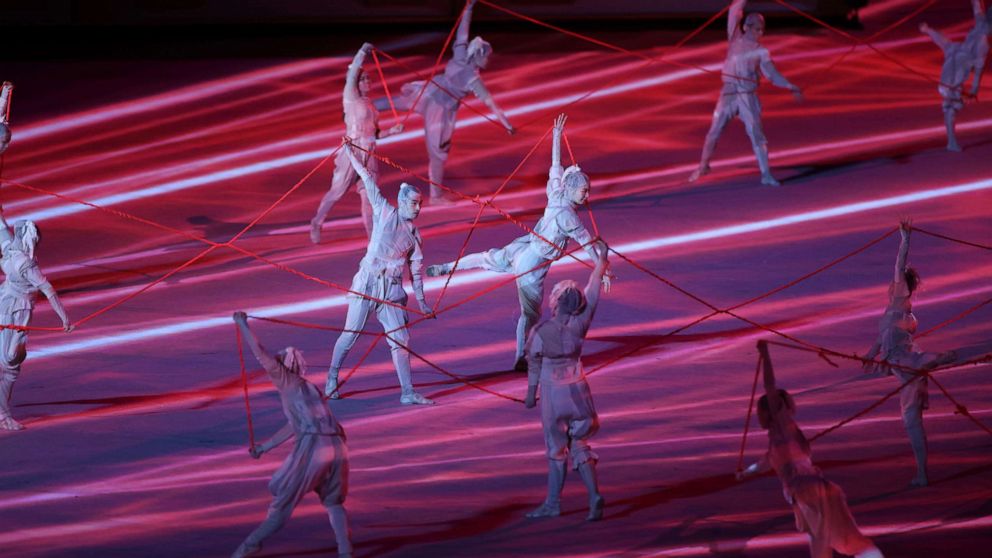 PHOTO: Dancers perform during the Opening Ceremony of the Tokyo 2020 Olympic Games at National Stadium in Tokyo on July 23, 2021.