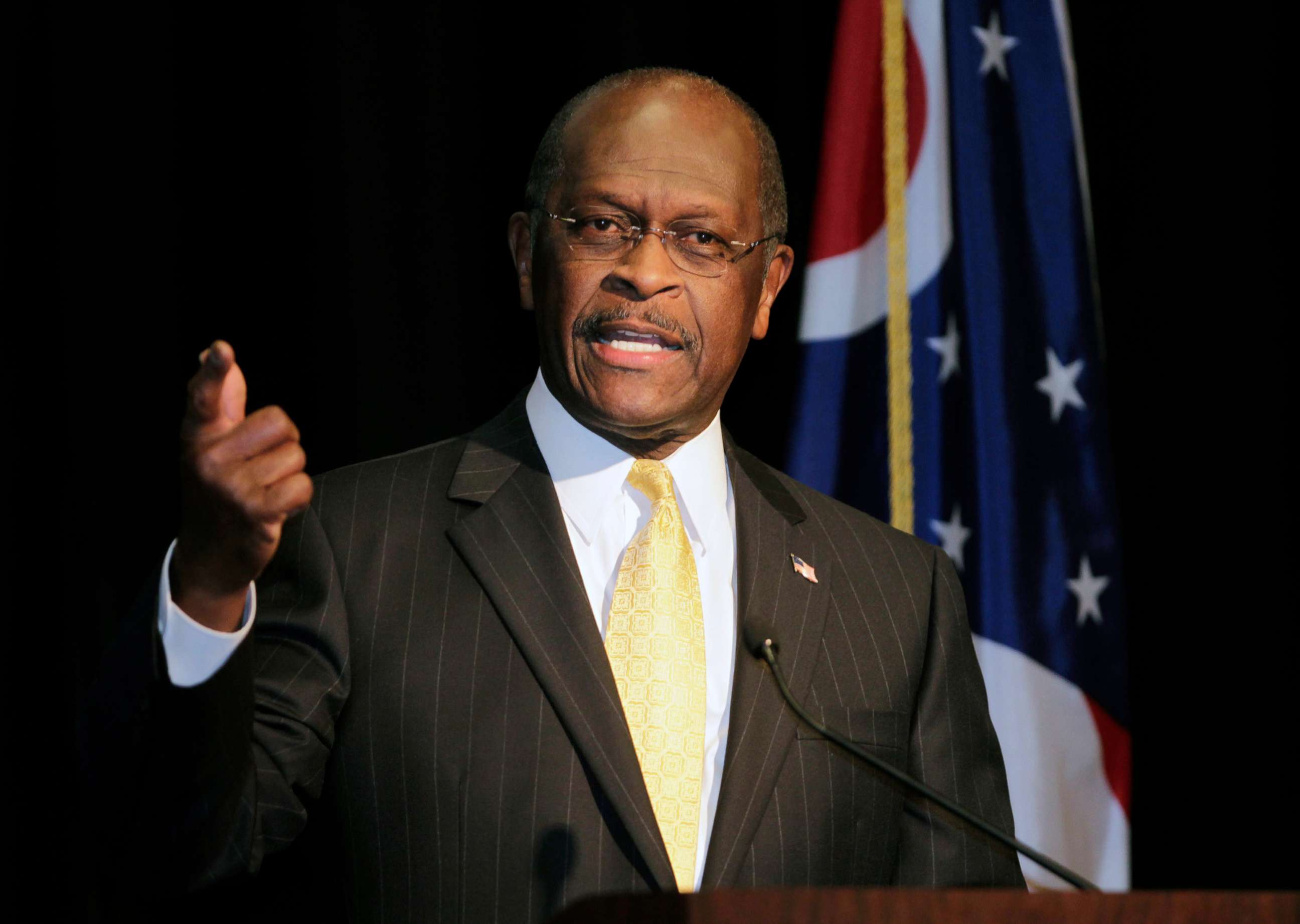 PHOTO: In this Nov. 30, 2011, file photo, Republican presidential contender Herman Cain addresses campaign supporters during a campaign stop in Cincinnati, Ohio.