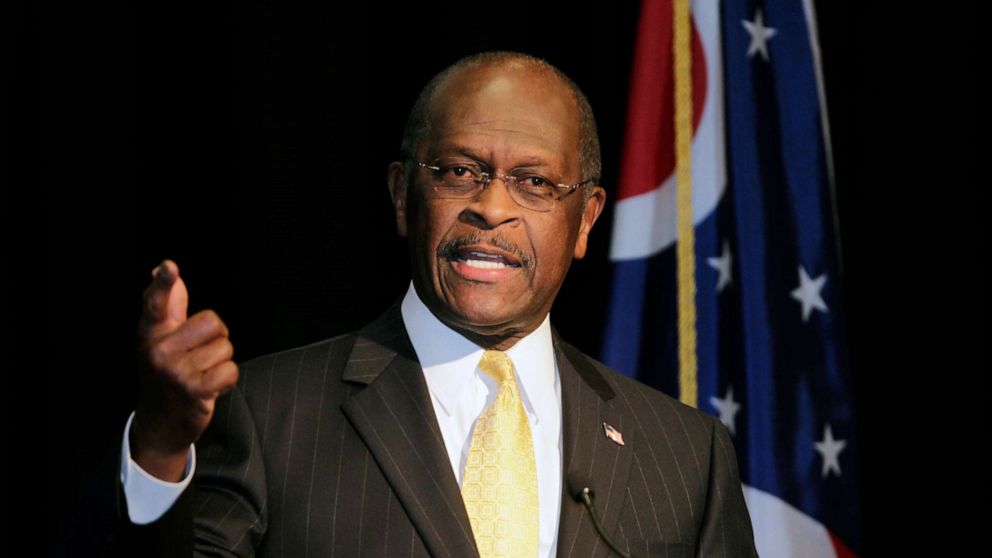 PHOTO: In this Nov. 30, 2011, file photo, Republican presidential contender Herman Cain addresses campaign supporters during a campaign stop in Cincinnati, Ohio.