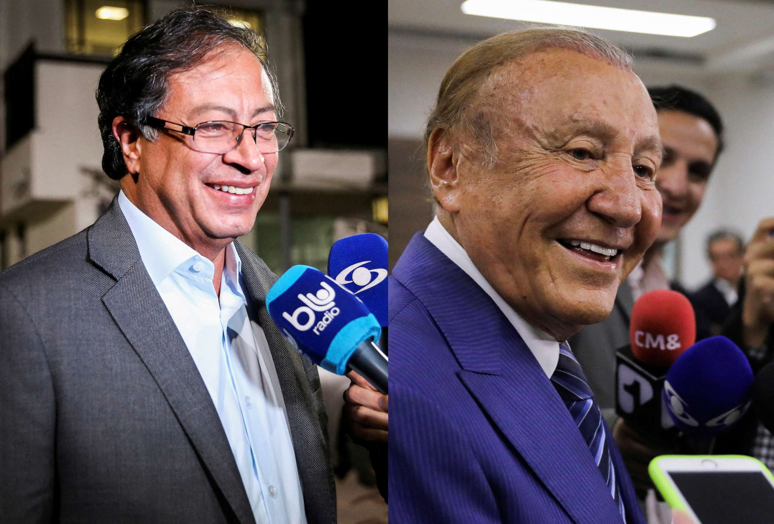 PHOTO: A combination picture shows Colombian presidential candidates Gustavo Petro and Rodolfo Hernandez speaking to the media in Bogota, Colombia, May 27, 2022 and May 24, 2022.