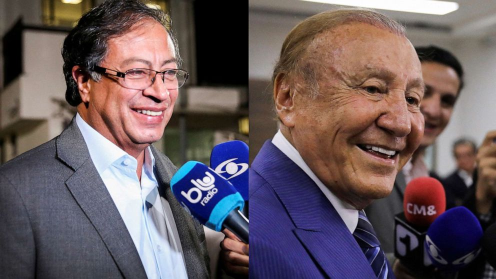 PHOTO: A combination picture shows Colombian presidential candidates Gustavo Petro and Rodolfo Hernandez speaking to the media in Bogota, Colombia, May 27, 2022 and May 24, 2022.