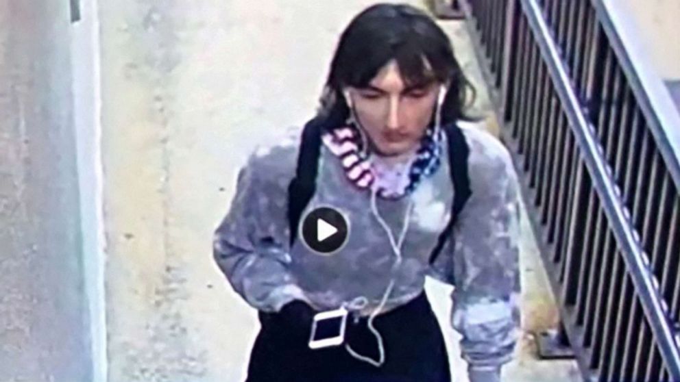 PHOTO: A still image from surveillance footage show a person dressed in women's clothing believed to be Robert (Bob) E. Crimo III, a person of interest in the mass shooting at a Fourth of July parade route in Highland Park, Ill., July 4, 2022. 