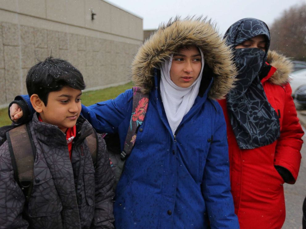 PHOTO: Khawlah Noman,center, with her mother Saima Samad,right, and younger brother after she held a press conference claiming a man cut her hijab with scissors in Toronto, Ontario, Canada, Jan. 12, 2018. The Toronto police are disputing her claim.