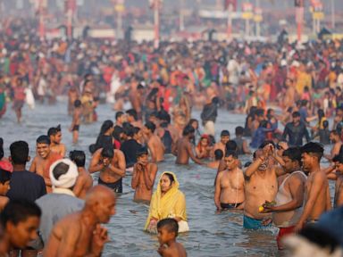 AP PHOTOS: Hindu festival draws crowds of bathers to rivers
