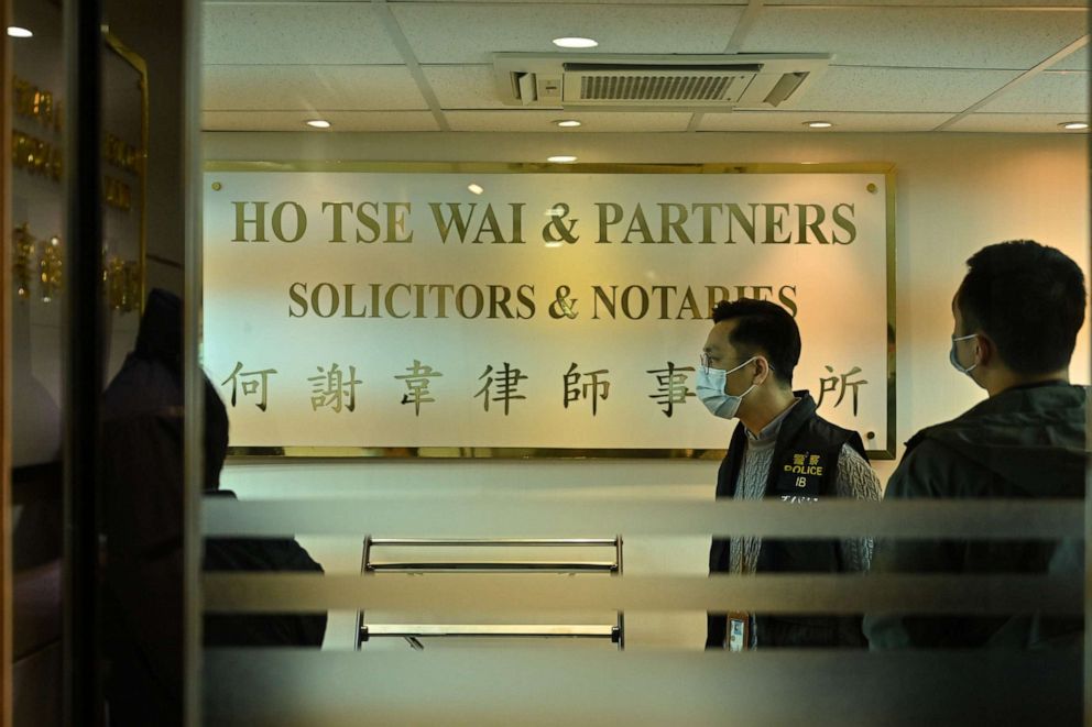 PHOTO: Police are seen inside the office of the law firm Ho, Tse, Wai & Partners in Hong Kong on Jan. 6, 2020, after dozens of pro-democracy figures were arrested under a controversial national security law.