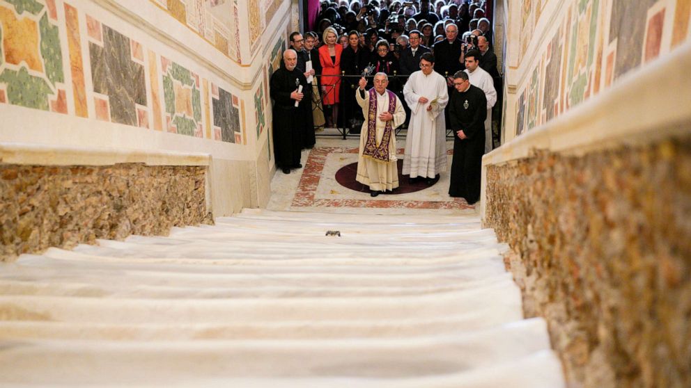 PHOTO:The Cardinal Vicar of Rome, Angelo De Donatis, blesses the restored Holy Stairs (Scala Sancta), which according to Catholic Church is the stair on which Jesus Christ stepped leading on his way to the crucifixion, in Rome, Thursday, April 11, 2019.