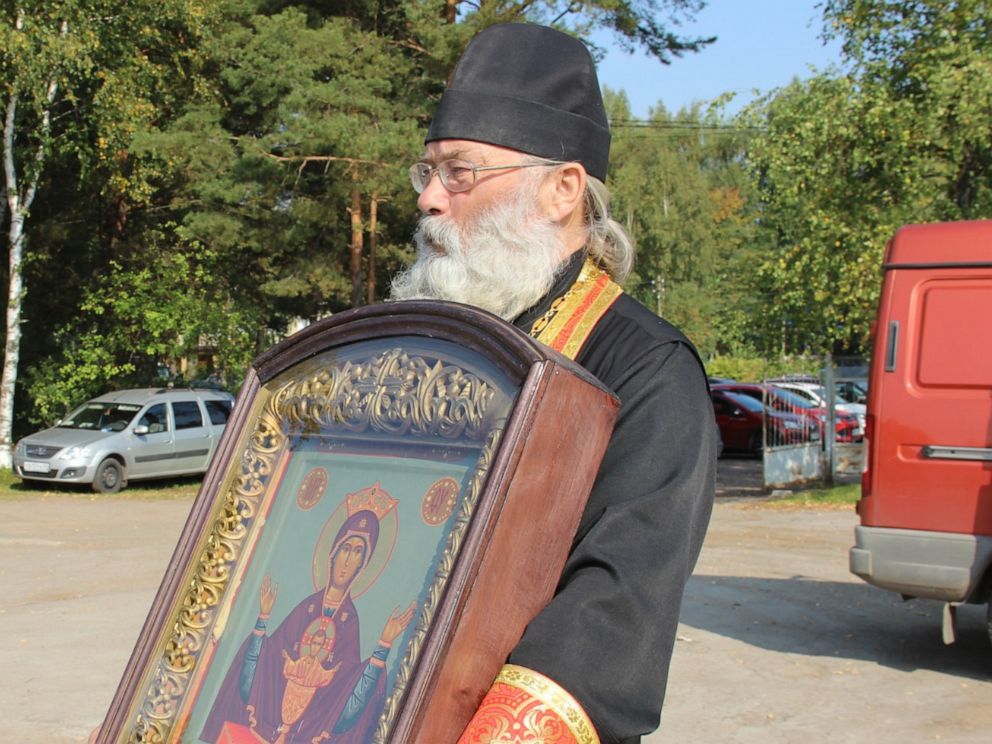 PHOTO: Priests from Tver, Russia are spraying holy water from an airplane to cure drunkenness.